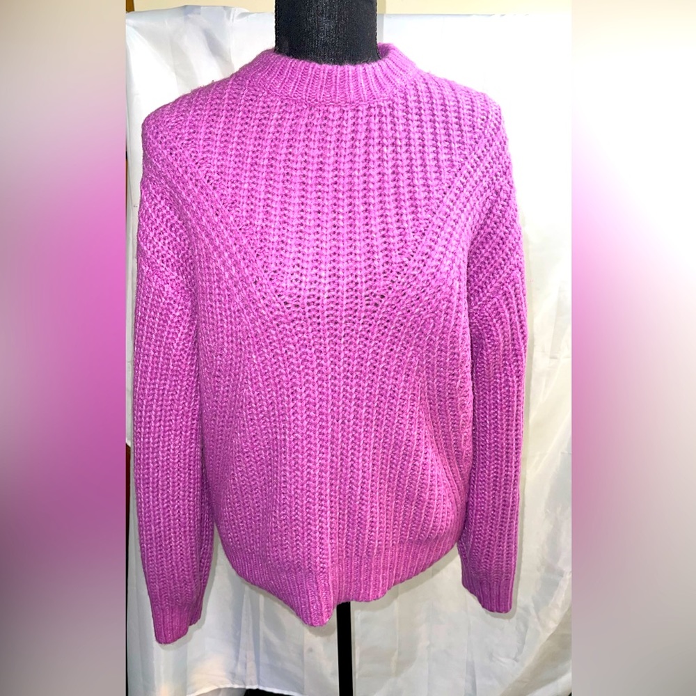 Women’s pretty in pink sweater.